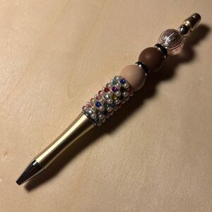 Elegant Beaded Pen with Gold Accents